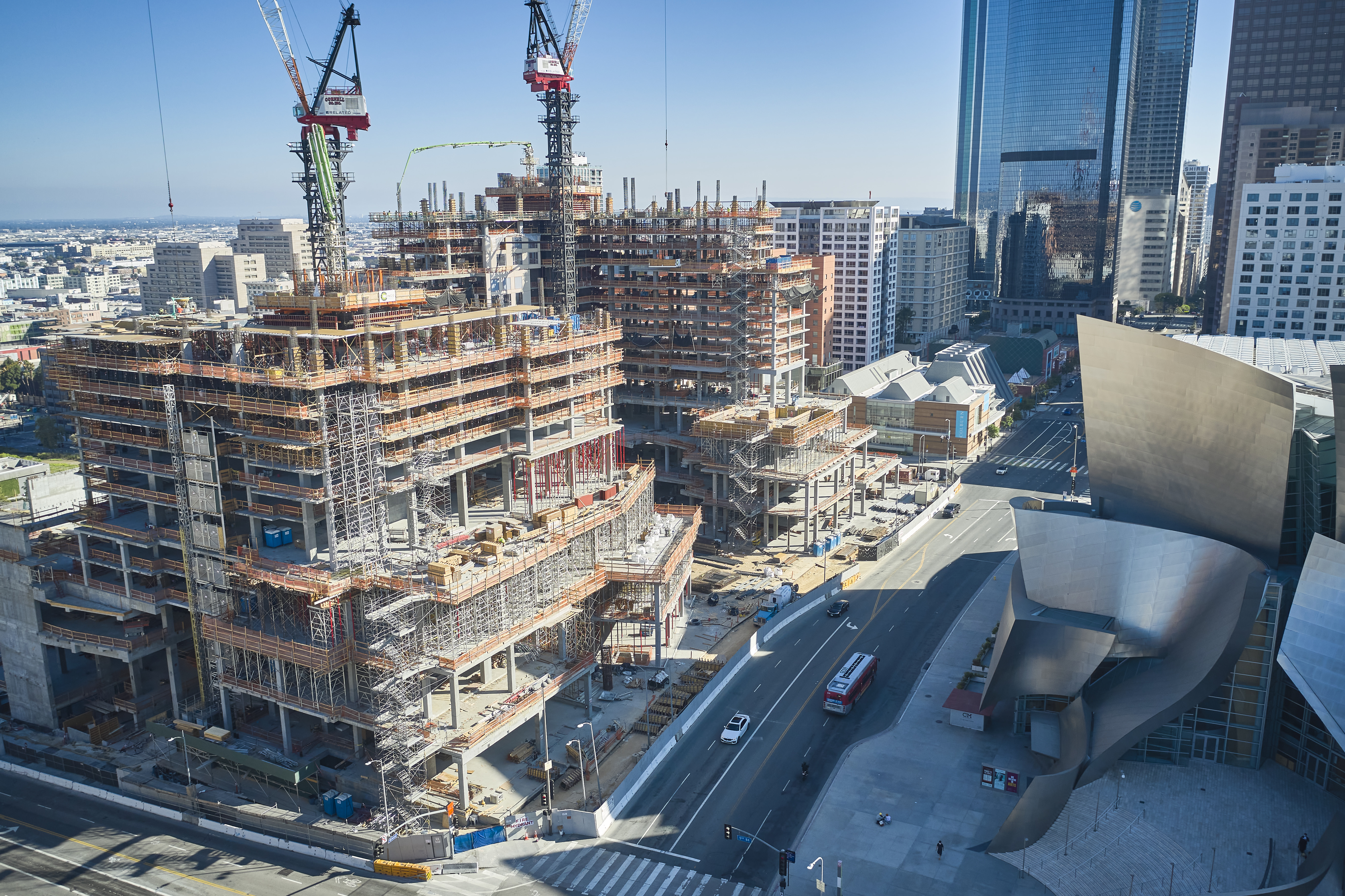 Construction Team Working on Development of The Grand LA, Multiple Levels Already Developed, Staging and Cranes Located in Image