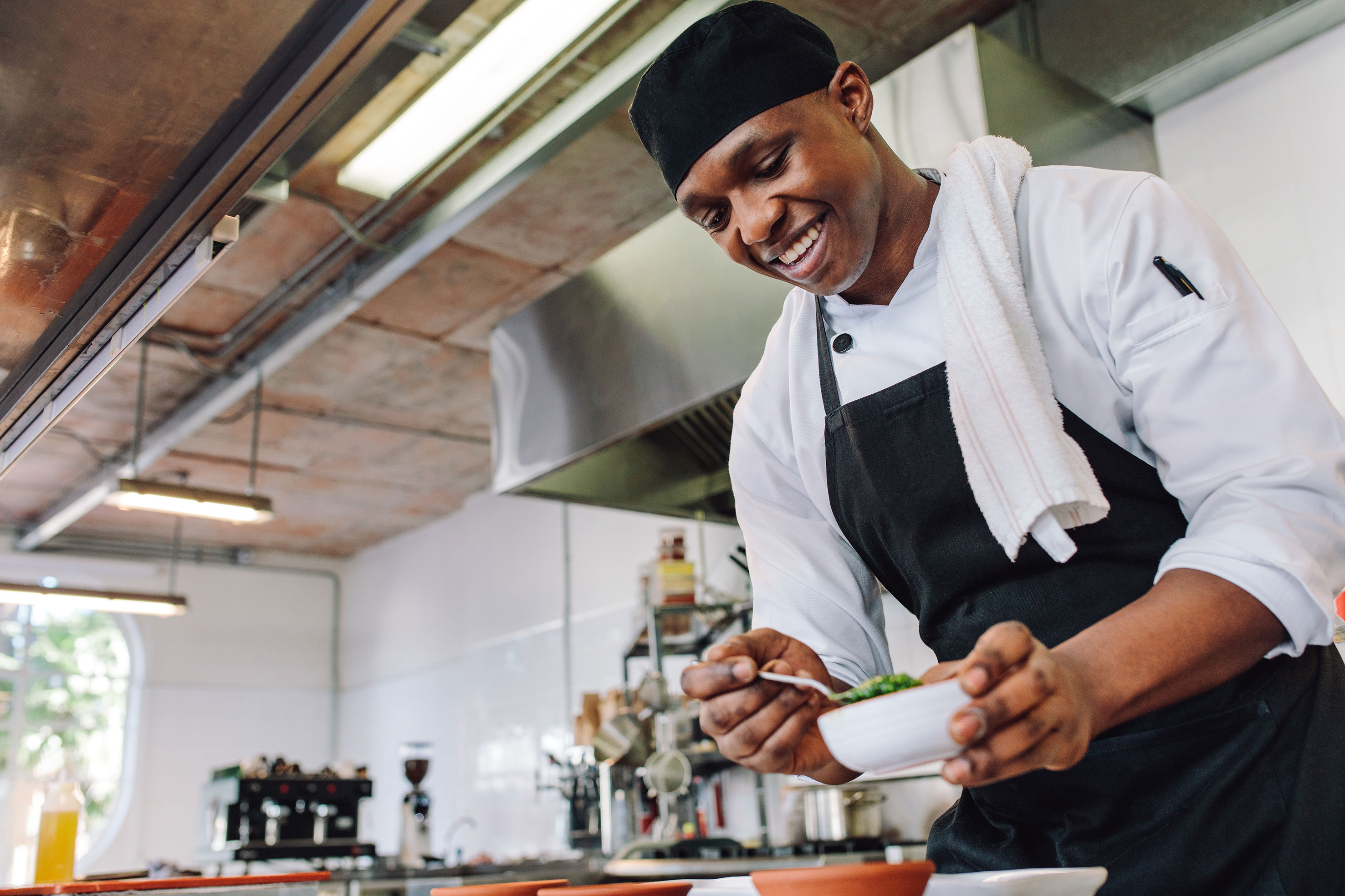 Male Chef in Kitchen, Preparing a Meal